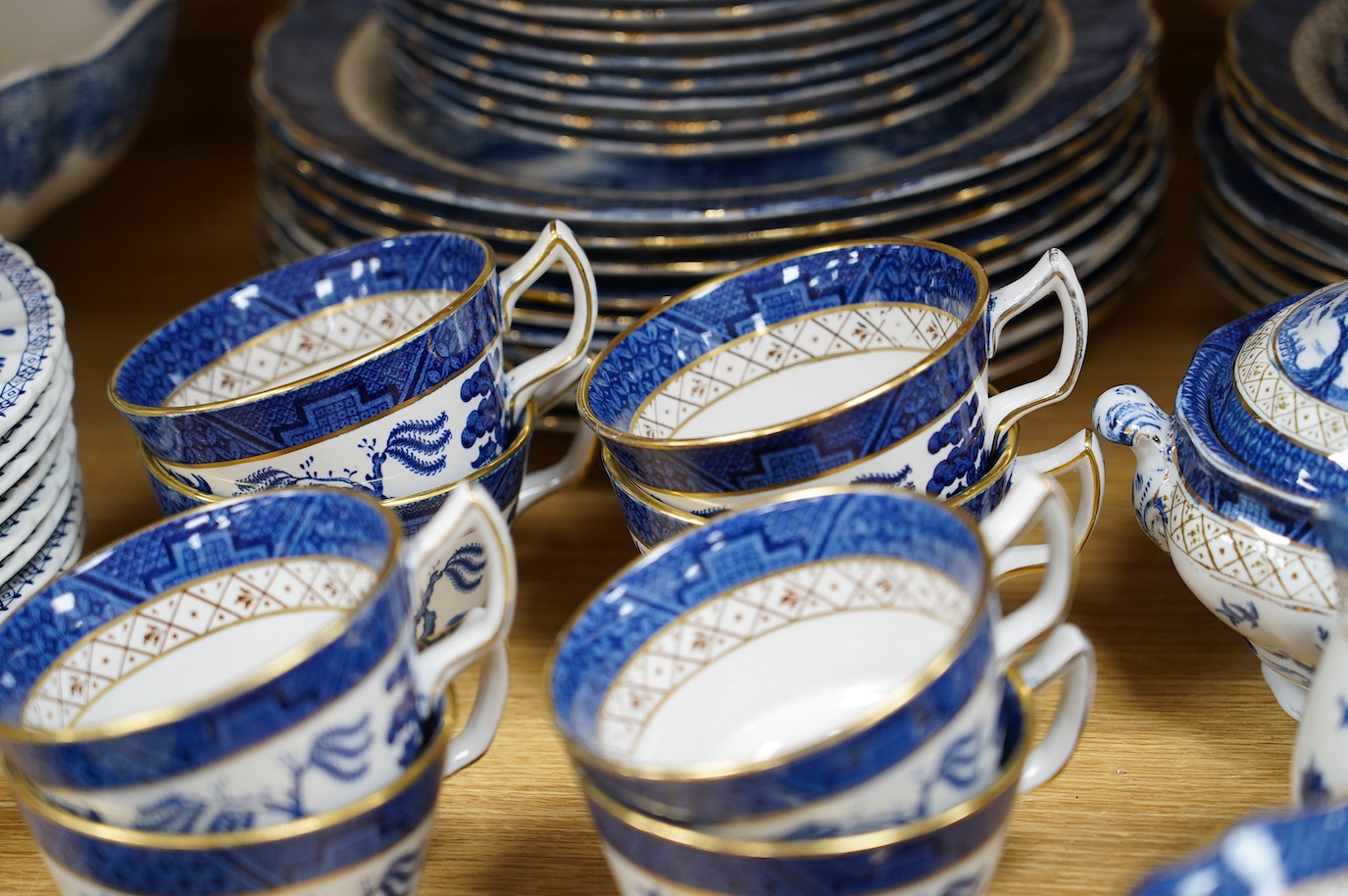 A large collection of Booths Real Old Willow, Woods Ware Willow and Old Chelsea blue and white dinner wares - condition - fair to good